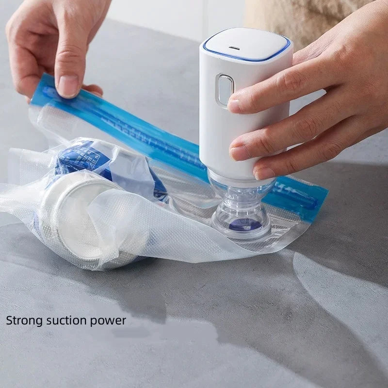 Zippered vacuum food storage bags with a handheld electric air pump, ideal for kitchen and refrigerator organization